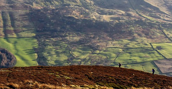 Navigation training above Edale in Peak District, UK.