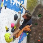 Climbing on a indoor climbing wall whilst on a Climbing Wall Instructor assessment