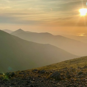 Sunset view of Snowdonia from Carnedd Dafydd on a Guided hillwalking course in Snowdonia.