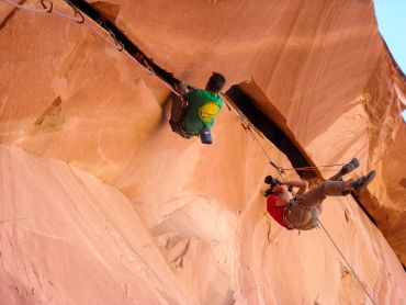 Alex Ekins photographing Tom Randall climbing Berry Full of Bad Berries in Indian Creek in Utah, USA