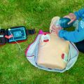Delivering CPR on an outdoor first aid course in the Peak District