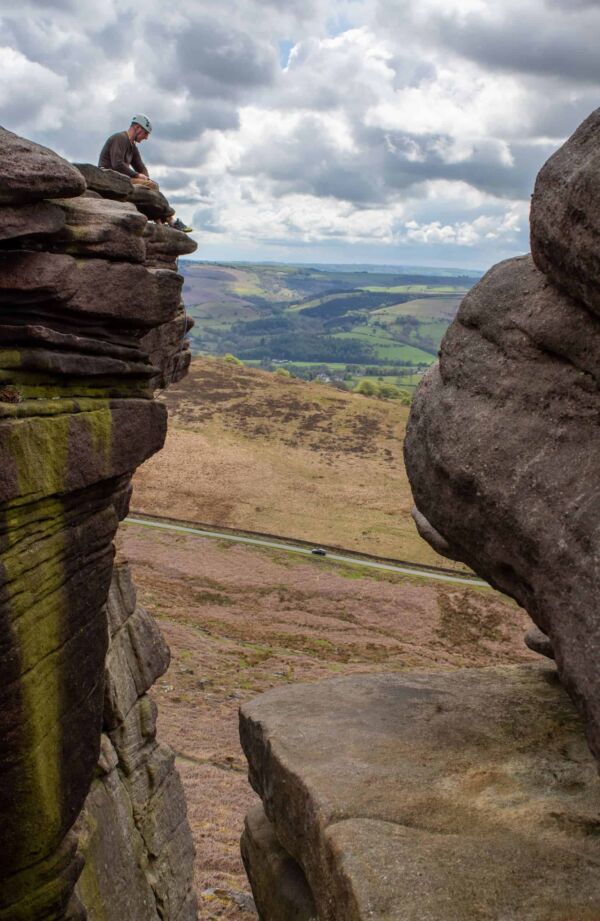 Climber belaying at the top of Stanage Edge © Luke Fletcher