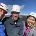 A group smiling on a Mountain Skills course
