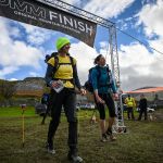 Two women at the finish line for the OMM 2023