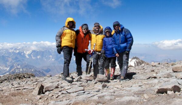 Aconcagua summit. Everyone in down jackets.