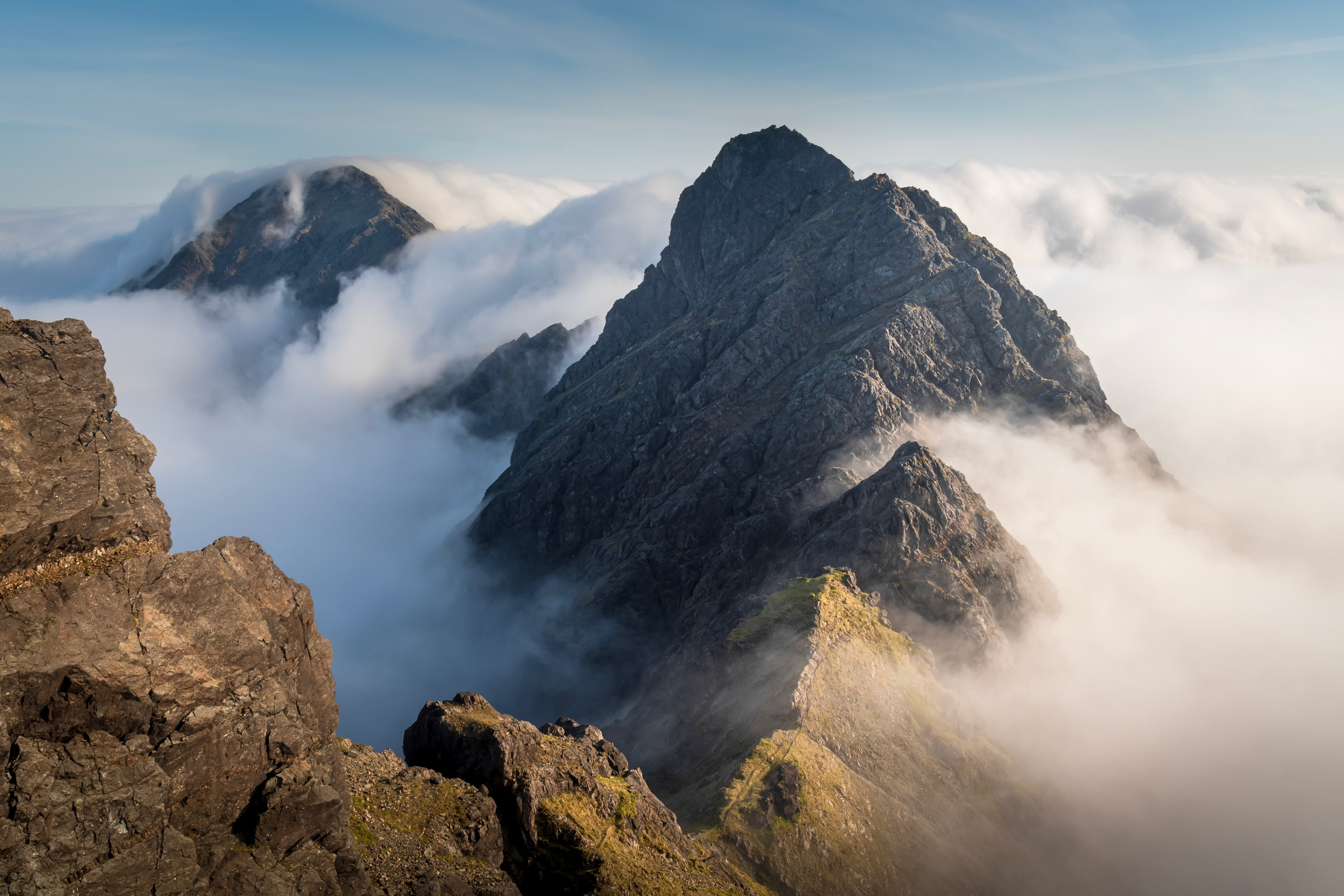 The Cuillin of skye with scrambling peaks emerging from the cloud.