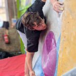 A man bouldering on bouldering wall Instructor training course at The Works, Sheffield.
