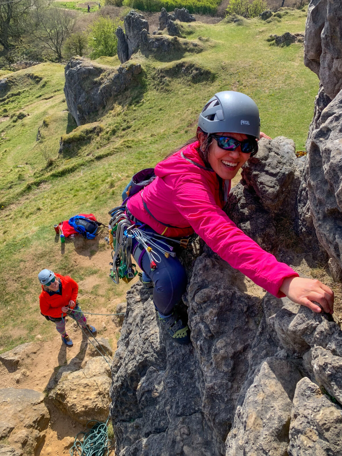 Two ladies learning to lead climb in the Peak District.