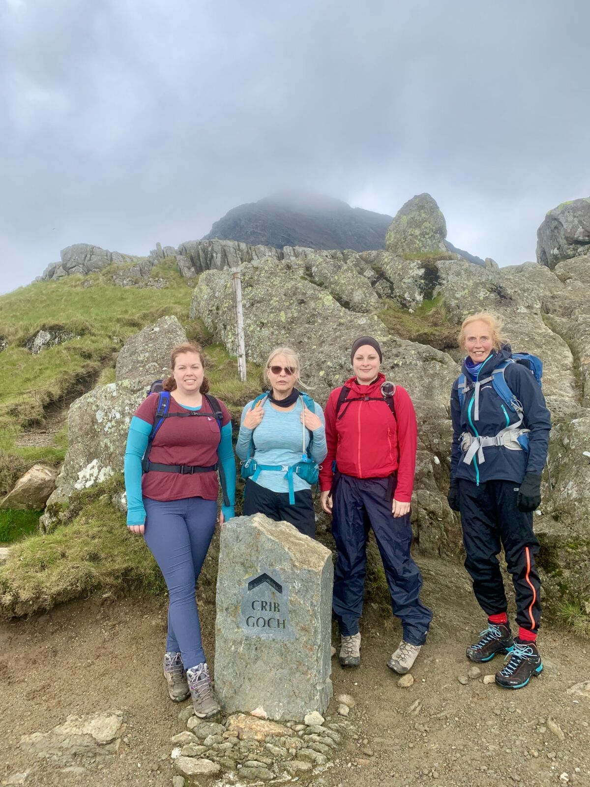 A group about to start scrambling across Crib Coch ridge in Eryri whilst on a scrambling course with Beyond the Edge.