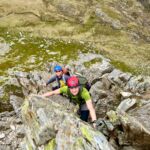 Two men on an Advanced Scrambling course on Cneifon Arete in Eryri.