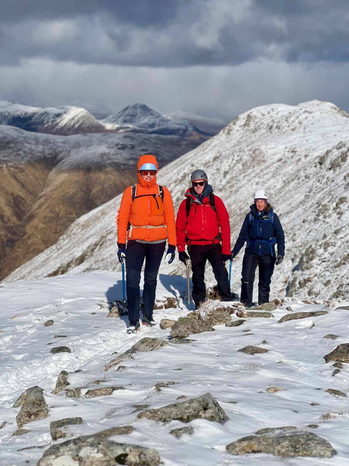 A group with ice axes on a guided winter walking week in Glencoe in Scotland.