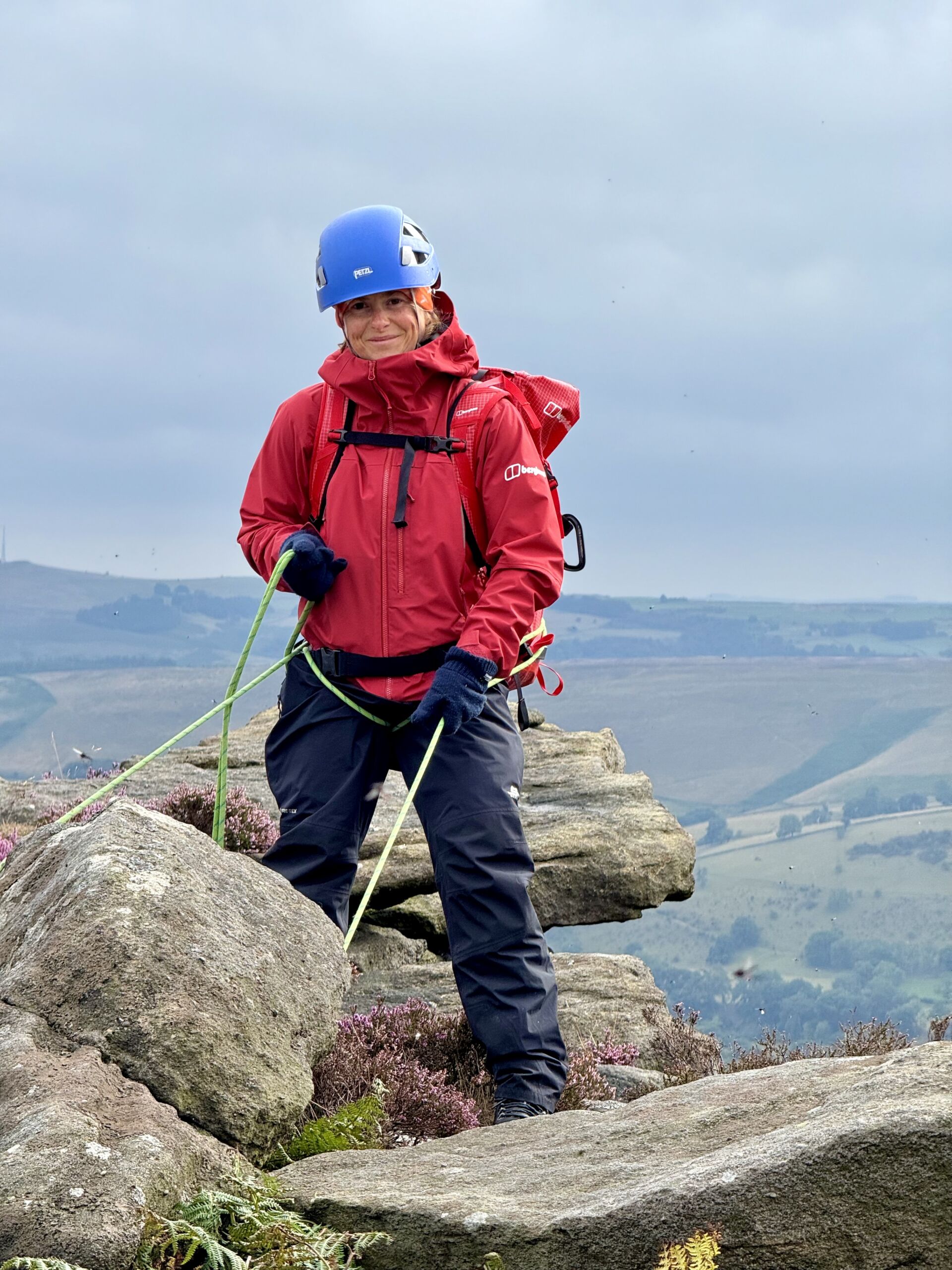 A lady practicing a South African abseil for her Mountain Skills.