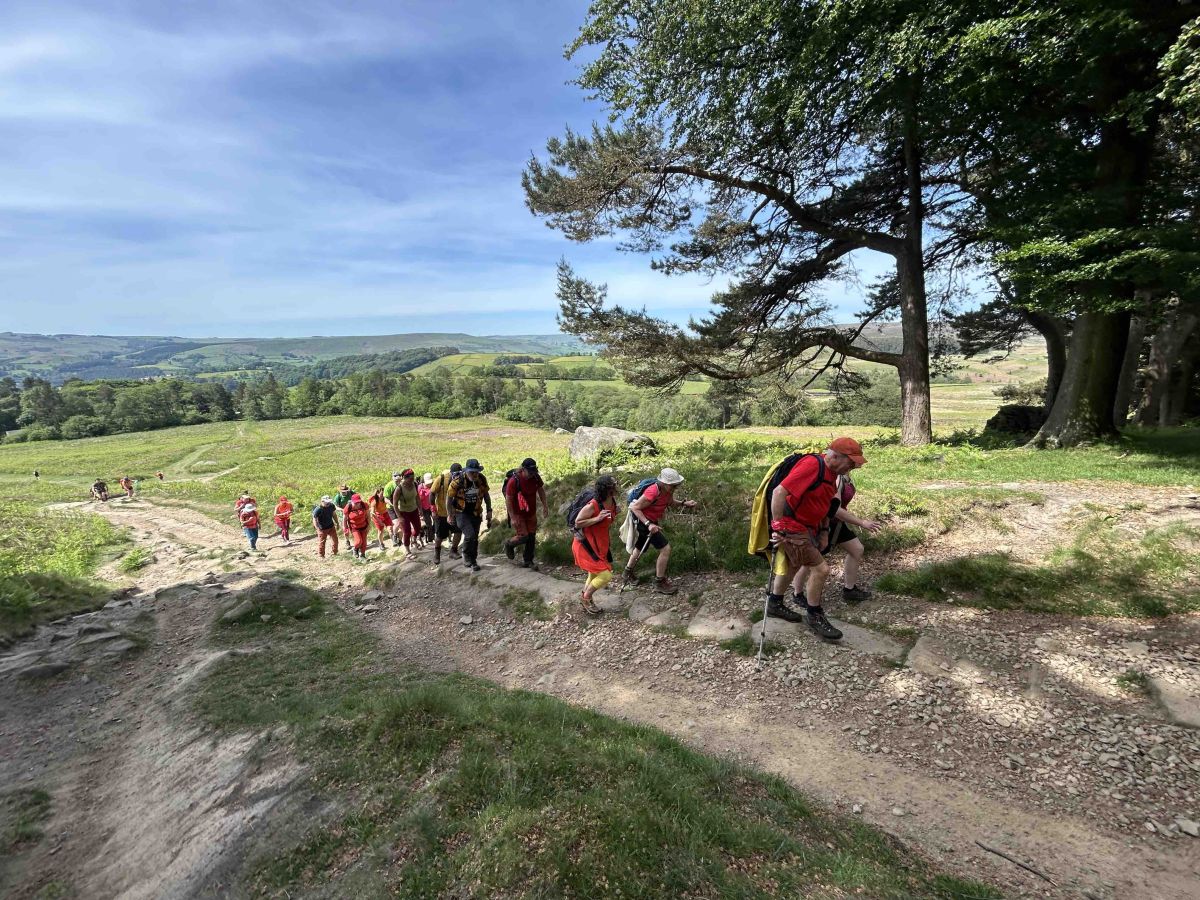 Walkers in the Peak District. Everyone wore fire_ colours for the sponsored Wildfire Walk